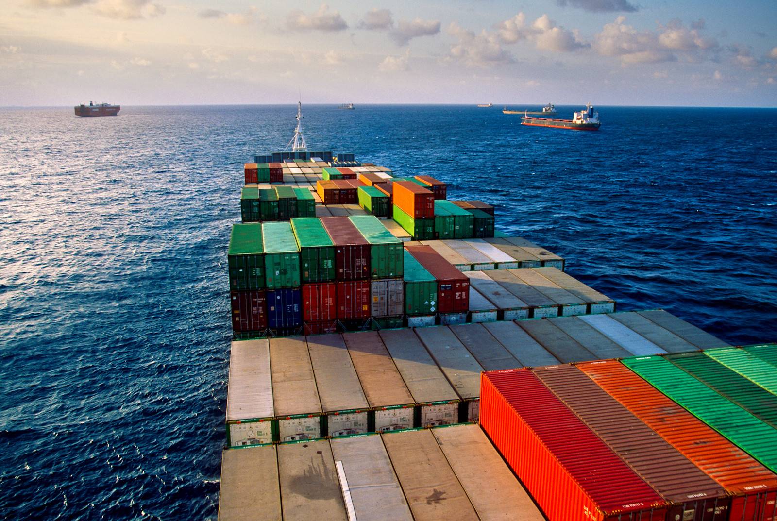 Container vessel at sea — AFCOS fuel and voyage optimization